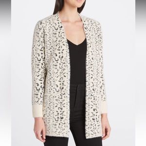 EVOLUTION BY CYRUS
Wallie Fuzzy Open Cardigan NWT!